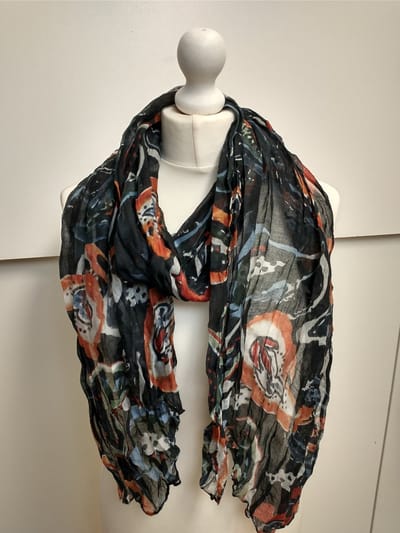Lange dames sjaal Emmely fantasiemotief oranje zwart wit rood groen bruin