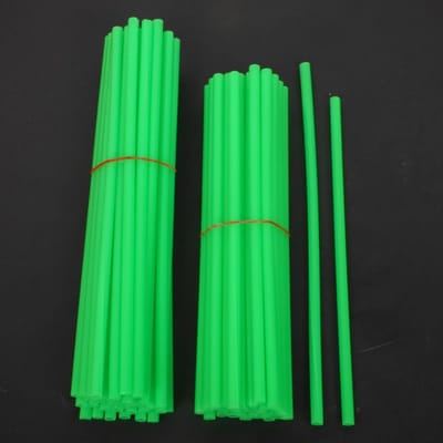 verpakking van 76 fluorescerende groene spaakbeschermers voor en achter voor motorcross enduro trial fietsen - nieuw