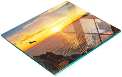 Duurzaam en stijlvol glazen bord met een zonsondergangpatroon van 60x52 cm