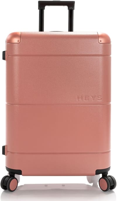 Heys Zen 4 wielen Trolley M 66 cm met uitbreidingsplooi - Harde bagage - TSA slot - coral
