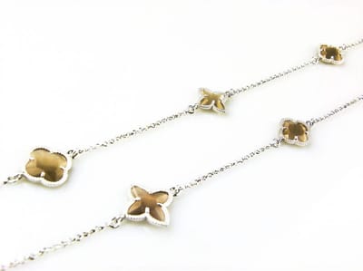 model Fiori gemengde motieven collier in zilver bruine gemengde motieven