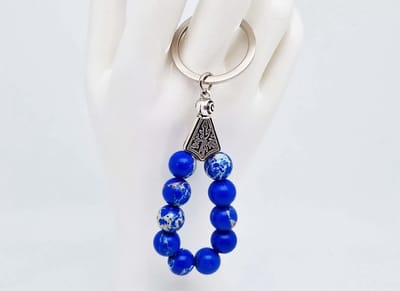 Handgemaakte druppel sleutelhanger van natuursteen " Lapis Lazuli" en metaal - diameter kralen 10mm - Aantal stenen10- Een mooi cadeau-idee en een bijzonder aandenken