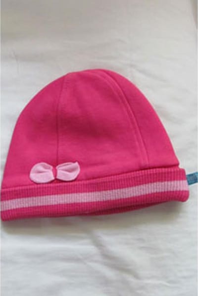 Lief! muts fuchsia roze met strikje, maat 2