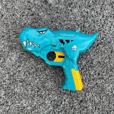 Jolie Pistolet à Sucette Dinosaure Bonbons Jouets Sucrés pour Enfants Jouet Original Boîte de Rangement Sucre pour Enfants Cadeau d'Anniversaire Amusant Jouets pour Chat 1 Pc bleu