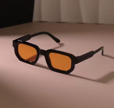 Zonnebril - Zwart Montuur - Oranje glazen - Unisex -Trendy Mode Bril voor Mannen en Vrouwen - Festivals - Koningsdag