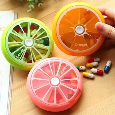 Pillendoosje met automatisch draaimechanisme | Medicijnen voor een week | Leuk design | Oranje