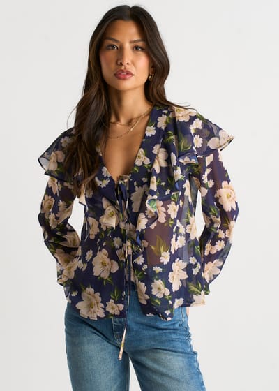 Marineblauwe blouse met bloemenprint en ruches aan de voorkant