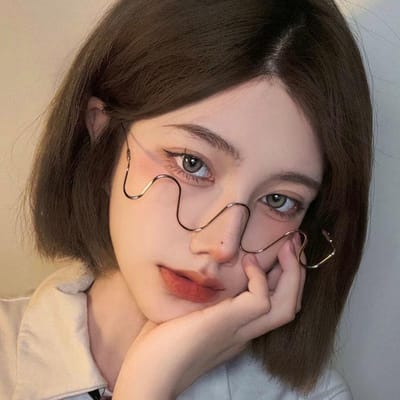 Lunettes de célébrité Internet à monture en diamant ondulé sans verres, forme concave, tendance et personnalisée, lignes décoratives, miroir amincissant et ne marquant pas le visage brown