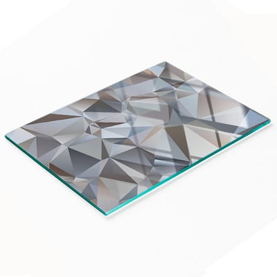 Stijlvol en duurzaam glazen bord met abstracte driehoekprint, 80x52 cm