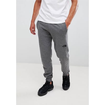 The North Face NSE Heren Fleece Cuffed Joggers Pant Grijs