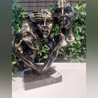 Decoratieve beeldje - gezichten - zwartgoud