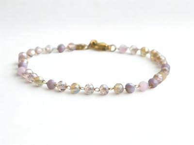 Stainless Steel Armband met Gemengde Pastel Gekleurde Kristallen - Goudkleurig - The Jewellery Salon - Fijne damesarmband