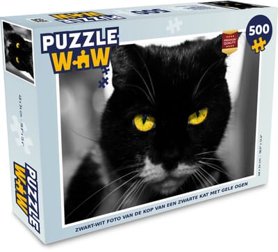 Puzzel Zwart-wit foto van de kop van een zwarte kat met gele ogen - Legpuzzel - Puzzel 500 stukjes