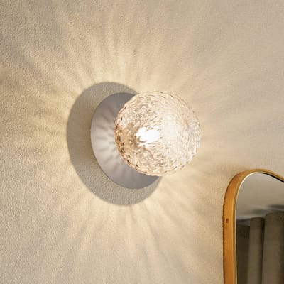 Nuura Aps Nuura Liila 1 wandlamp, Ø 14 cm, IP44, zilver/helder