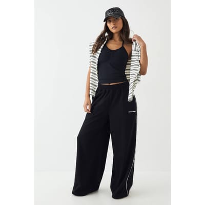 Dames DSGN Studio Joggingbroek met Pijpdetail Middelhoge Taille Wijde Pijpen | Zwart | Maat: Medium