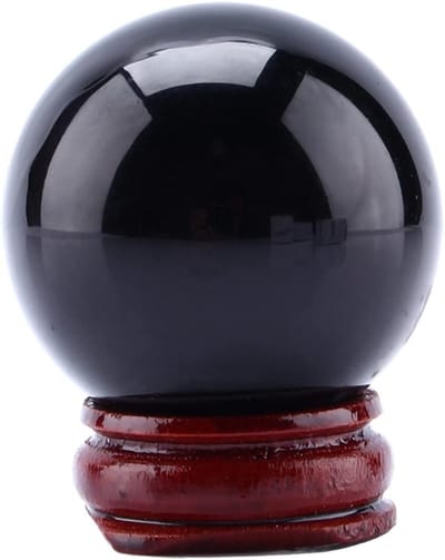 Zwarte obsidiaan kristallen bol van 40 mm voor unieke interieurdecoratie en feng shui toepassingen