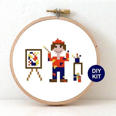 Manlijke Kunstenaar borduurpakket | Borduurpakket voor volwassenen | Kunstschilder kado maken  | Borduurpakket inclusief borduurring, DMC borduurgaren, Aida borduurstof, borduurnaald en instructies
