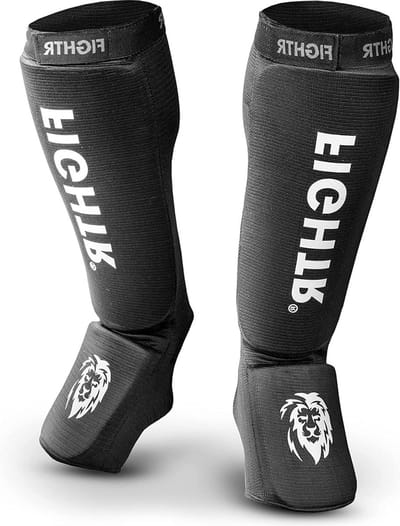 Scheenbeschermers met perfecte pasvorm en ideale bekleding voor kickboksen MMA Muay Thai