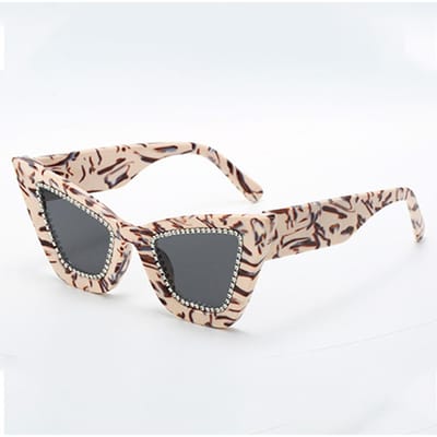 Lunettes de soleil œil de chat cloutées de diamants pour femmes Marque de luxe UV400 Montures stylées Punk Unisexe