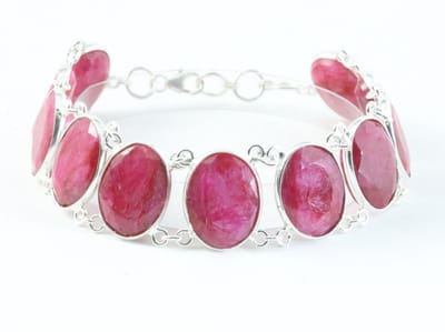 Zware zilveren armband met grote robijn stenen