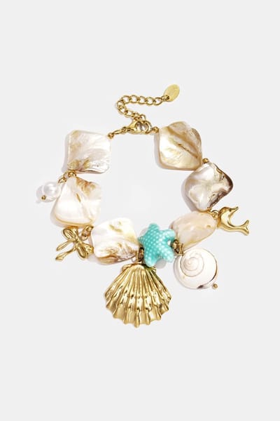 Goudlief Armband met schelpen - zee charms - goude en blauwe kralen - Roestvrij staal - Verkleurt niet