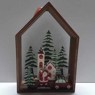 Kerst decoratie houten huis met kerstman in winters tafereel