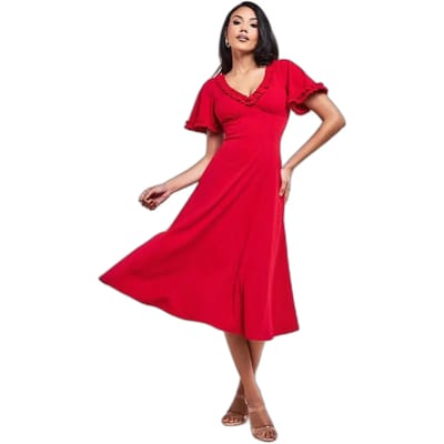 Langarmige midi-jurk met flared mouwen en een volantrand vrouw Goddiva