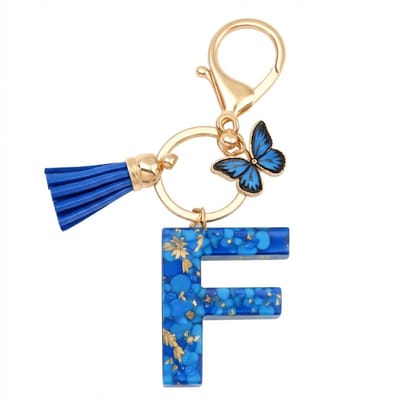 Blauwe letter F sleutelhanger met kwastje en vlinder – sleutelhanger voor dames – goudkleurige metalen keychain met acryl initiaal F hanger, decoratieve bedel en tassel