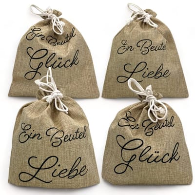Dailygoods- Geschenkzakjes 4-delige set - Duurzaam 100% polyester - Cadeauzakjes met spreuken - Trekkoord - Perfecte geschenkverpakking - 22,5x26 cm