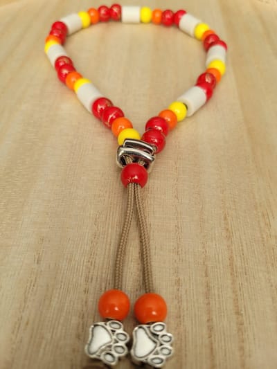 Anti Vlooienband / Tekenband EM-X Kralen 60-70cm ROOD/GEEL/ORANJE (GEEN RECHT OP RETOUR)