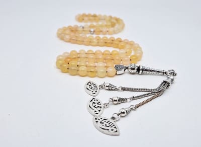 Handgemaakte tesbih "Tasbih" natuursteen " Calciet geel " - Aantal kralen 99 - Diameter kralen 8MM - met metaal tassel "Ogen" - Een mooi cadeau-idee