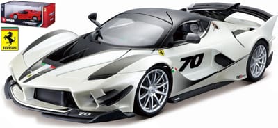 The 1:18 Diecast Modelcar of the Ferrari FXX K # 70 in White and Black. The manufacturer of the scalemodel is Burago.