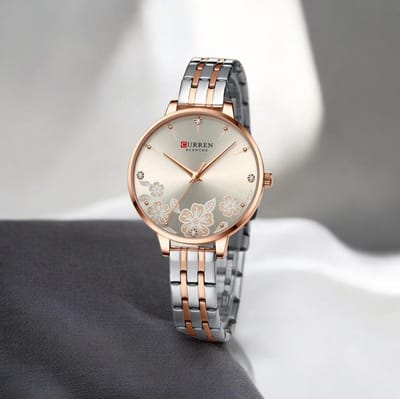 CURREN Dameshorloge Rosé Zilverkleurig Beige / Champagnekleurig Wijzerplaat Wijzerplaat - 35mm Bloemen Design Elegante Look