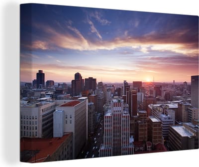 Canvas Schilderij Zonsondergang over Johannesburg - 90x60 cm - Wanddecoratie