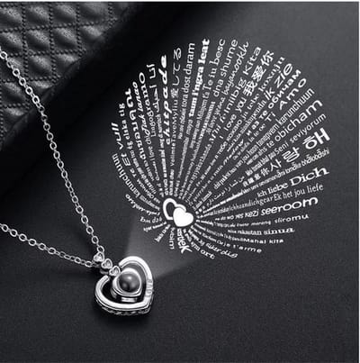 Hartje ketting - 100 Talen - I Love You - Liefdes Cadeau - Valentijn Cadeautje voor Hem / Haar - Zilverkleurig