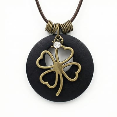 Donkerbruine koord ketting voor dames en heren met klavertje vier hanger en ronde hanger