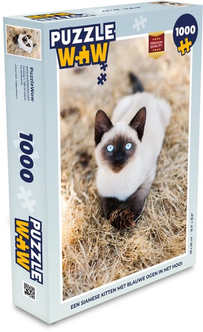 Puzzel Een siamese kitten met blauwe ogen in het hooi - Legpuzzel - Puzzel 1000 stukjes volwassenen