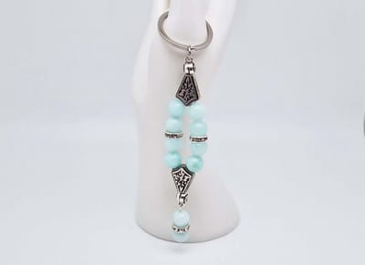 Handgemaakte Harmony Sleutelhanger van natuursteen " AAA Amazonium" en metaal - diameter kralen 10mm - Aantal stenen10- Een mooi cadeau-idee en een bijzonder aandenken