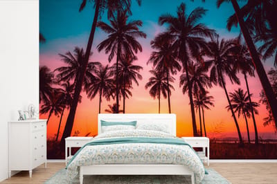 Behang - Fotobehang Palmboom - Zonsondergang - Horizon - Strand - Oranje - Roze - Breedte 330 cm x hoogte 220 cm