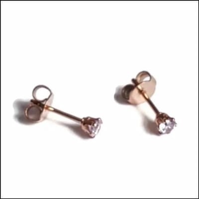 Rvs sieraden - RVS zirkonia oorbellen lila - 3mm - Rosegoudkleur