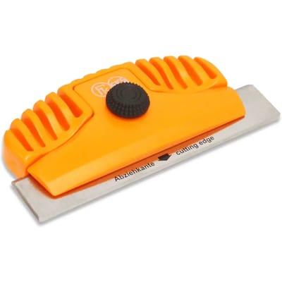 Planimeter en metalen schraper Vola