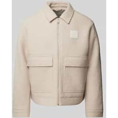 Wollen jack met labelpatch