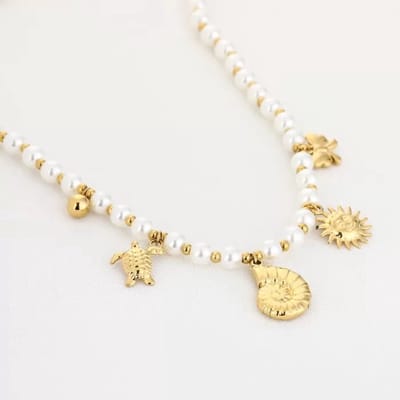 Parel ketting met strand bedels- goudkleur