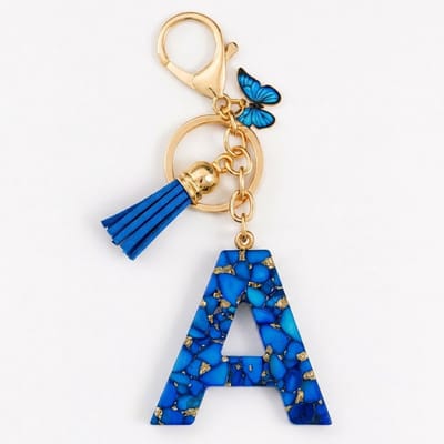 Blauwe letter a sleutelhanger met kwastje en vlinder – sleutelhanger voor dames – goudkleurige metalen keychain met acryl initiaal A hanger, decoratieve bedel en tassel