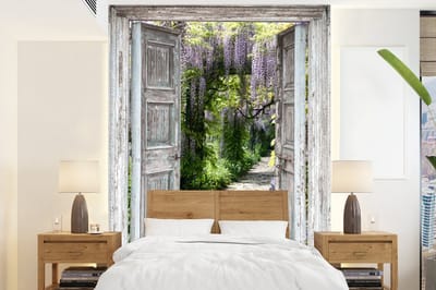 Behang - Fotobehang Doorkijk - Bos - Stenen - Lente - Breedte 195 cm x hoogte 260 cm