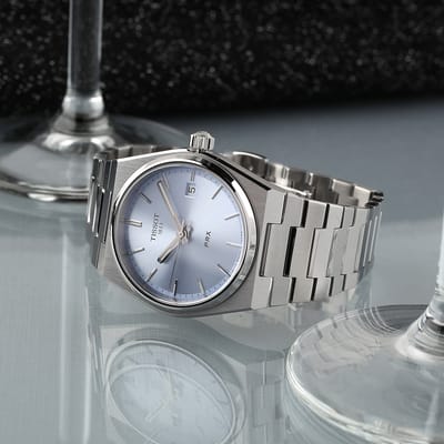 Montre unisexe Tissot T-Classic PRX en acier inoxydable avec cadran bleu clair et quartz T137.210.11.351.00 100M bleu