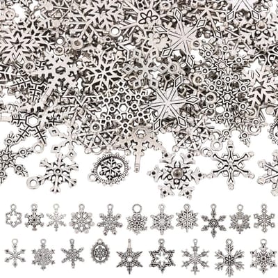 Dailygoods- Sneeuwvlok Hangers - 100 Stuks - Zilverkleurige Sieraden - Tibetaanse Geïnspireerd Ontwerp - Antieke Oppervlakteafwerking - Voorgeboorde Gaten 1,2 mm
