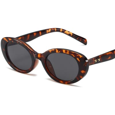 Luxe Designer Stijl Stijl Ovaal Zonnebril Brillen Dames Voor Mannen Trendy Klassiek Modieus Zon Zonnebrillen Ster Punk Roze Populaire Kleuren UV400