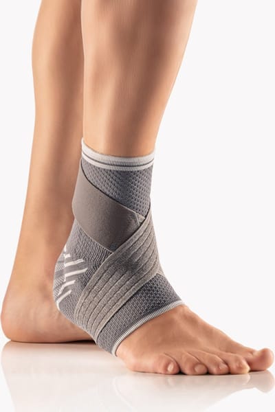 BORT activemed Enkelbrace met verstelbare Fixatieband – Enkelbandage met Siliconen Pelotten en Compressieklasse II – Ondersteuning bij Verstuiking, Artrose en Zwakke Enkelbanden – Maat S – Grijs