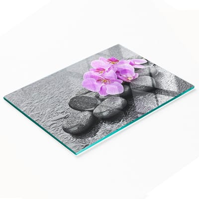 Decoratieve glazen snij- en serveerplank met orchideestenen 80x52 cm